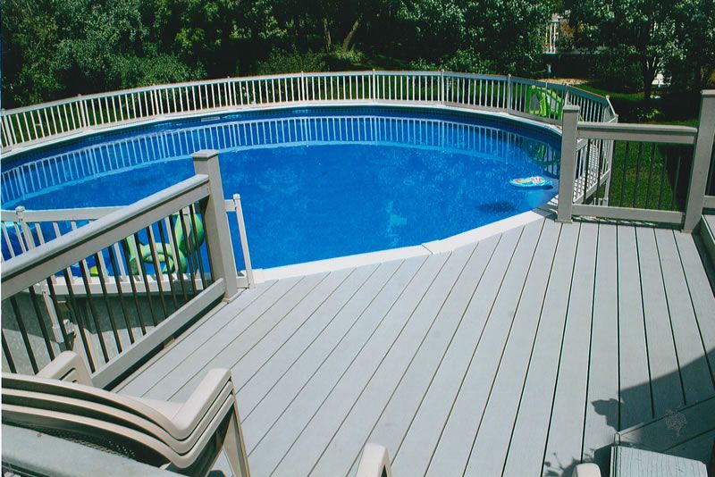 Round above ground composite pool with decks railing | Above .