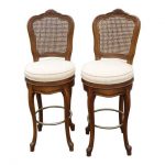 Image of French Country Carved Wood Cane Back Bar Stools - A Pair .