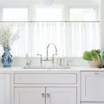 Sheer Cafe Curtains on Windows Over Kitchen Sink - Transitional .