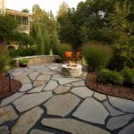 Flagstone Patio and Natural Stone Fire Pit - Traditional - Patio .