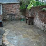 flagstone patio. I like how this is edged | Patio stones .