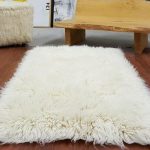 EXTRA-ORDINARY 3x5 Natural white flokati rug. Boasts a 4" shag .