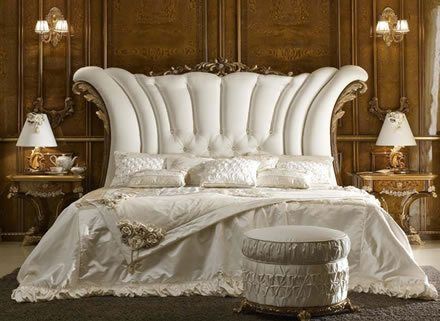 Luxury beds and high end bedroom furniture | White upholstered bed .