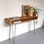 This is a classic hairpin leg console table which measures 85cm .