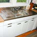 8 vintage style Elkay drainboard sinks for a midcentury kitchen .