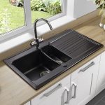 Double kitchen sink / ceramic / overmount / with drainboard .