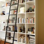 I can only dream of having bookshelves/library with a sliding .