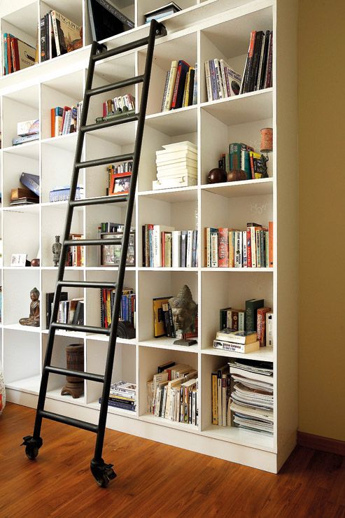 I can only dream of having bookshelves/library with a sliding .