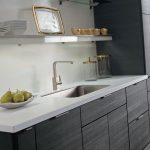 Contemporary laminate kitchen cabinets in woodgrain Obsidian .