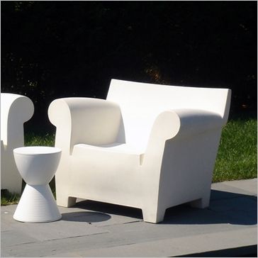 The Bubble Chair -- designed by Philippe Starck and made of white .
