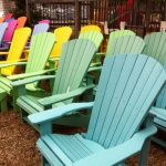 A rainbow of recycled plastic Adirondack chairs from The Cottage .