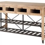 Trahern rolling kitchen island featuring ample storage space .
