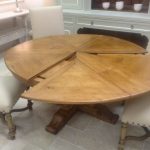60" ROUND EXTENDABLE SOLID WOOD DISTRESSED DINING TABLE (EXTENDS .