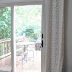 Curtains over sliding glass door... Held up with curtain clips .