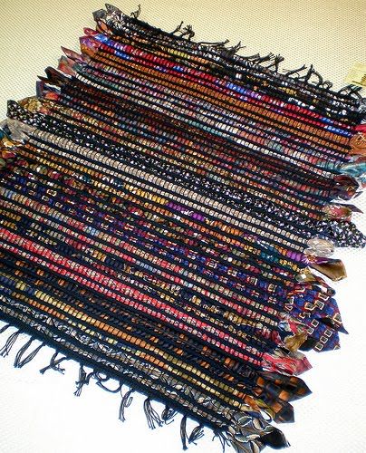 Not sure what to do with all those old ties....make a rug .
