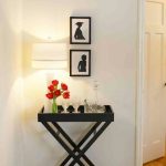 Simple Tray Table Entryway - for our extra folding tray tables .