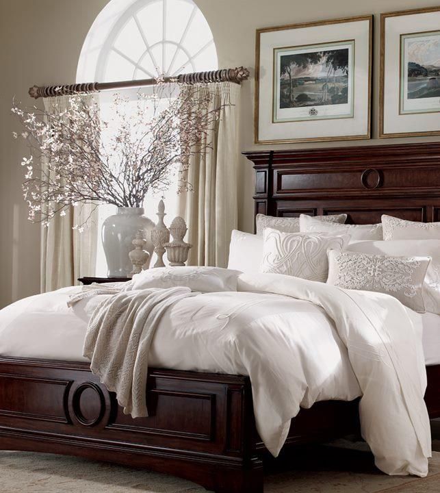 Bedroom decor--I love this look. Dark wood. White bedding .