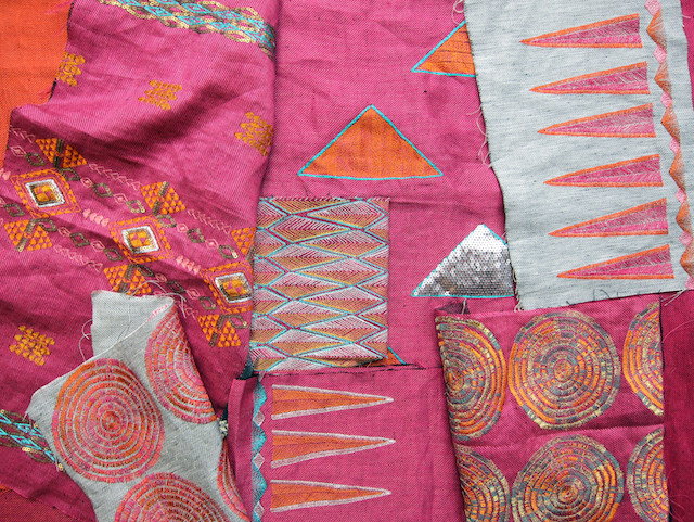 pink and orange embroidered fabrics