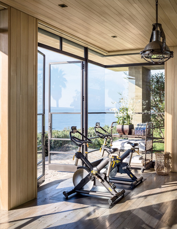 Glass doors to home gym overlooking the beach