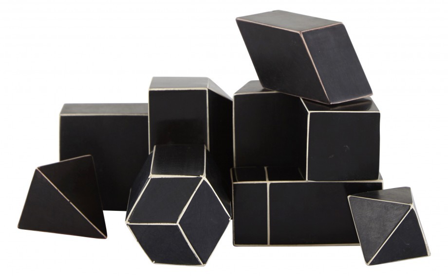 geometric objects in black and gold