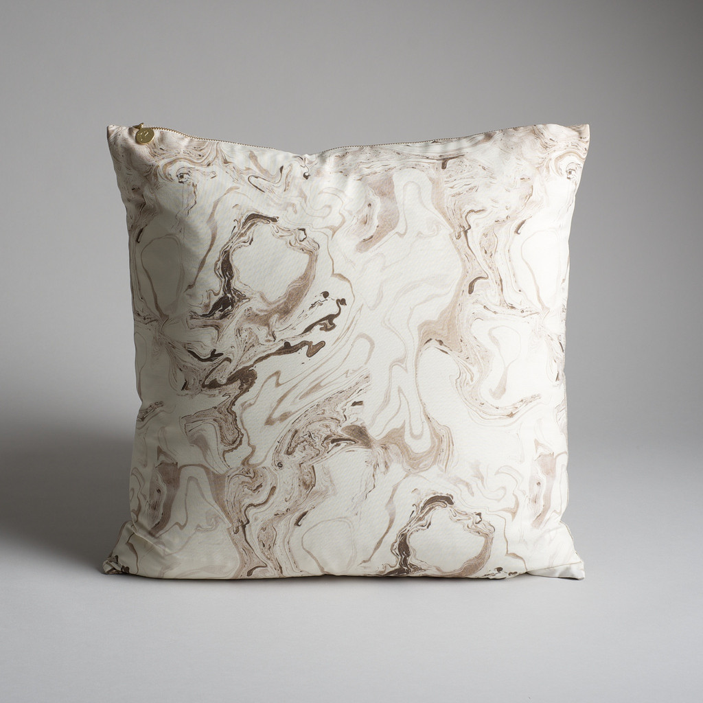 Ivory and gold marble cushions