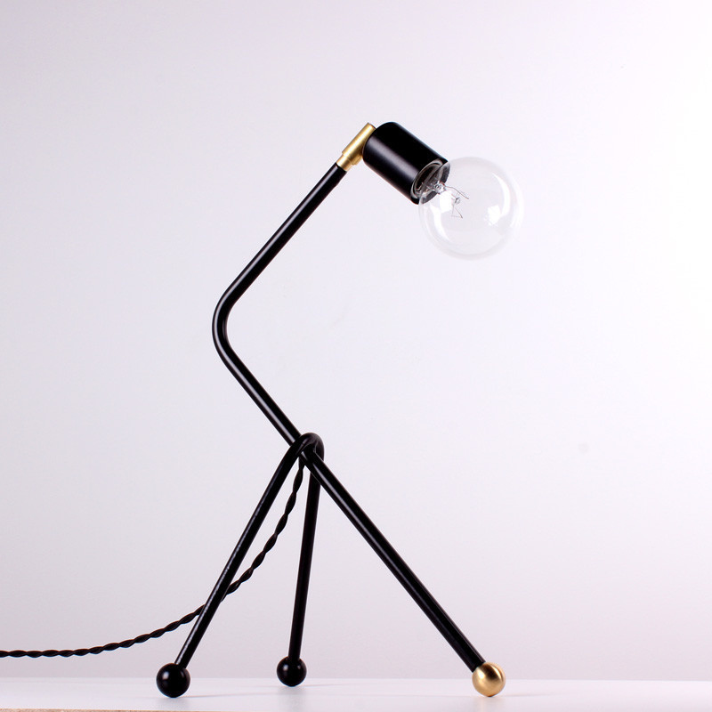 black tripod table lamp