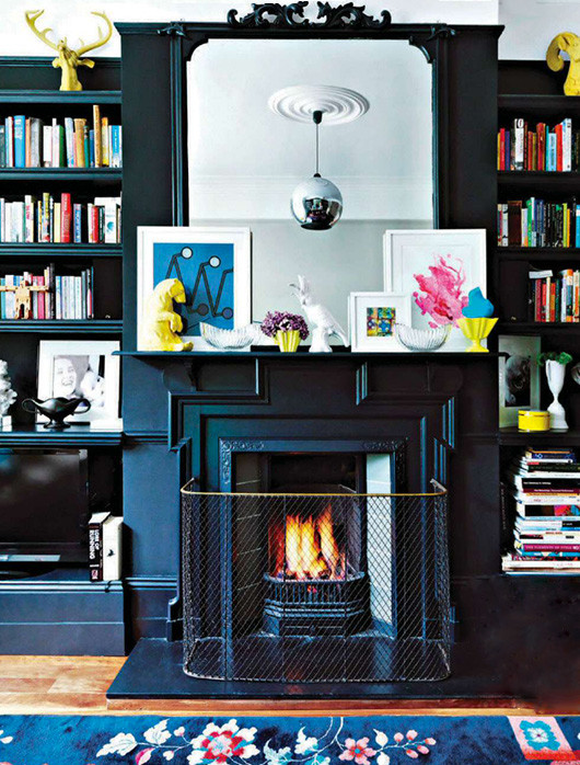 Neon artwork black lacquered fireplace