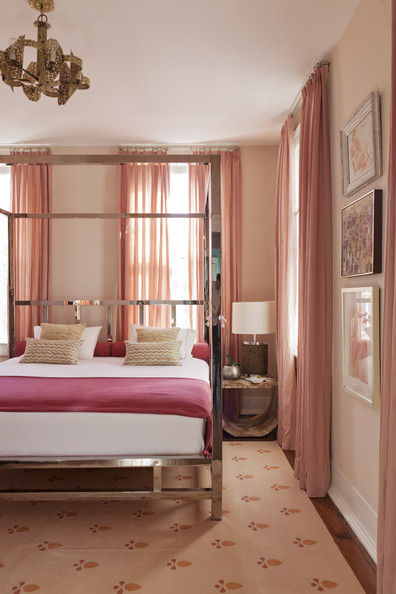 Blush modern bedroom with metal bed frame