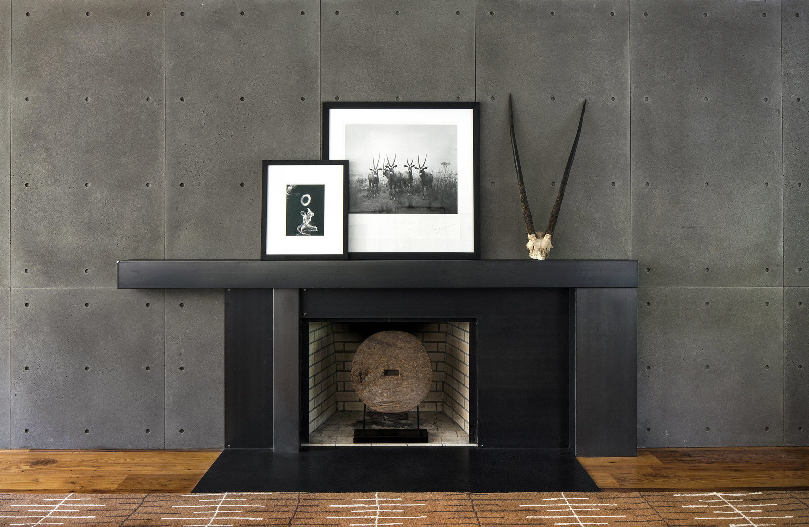 Sculpture in the modern black fireplace