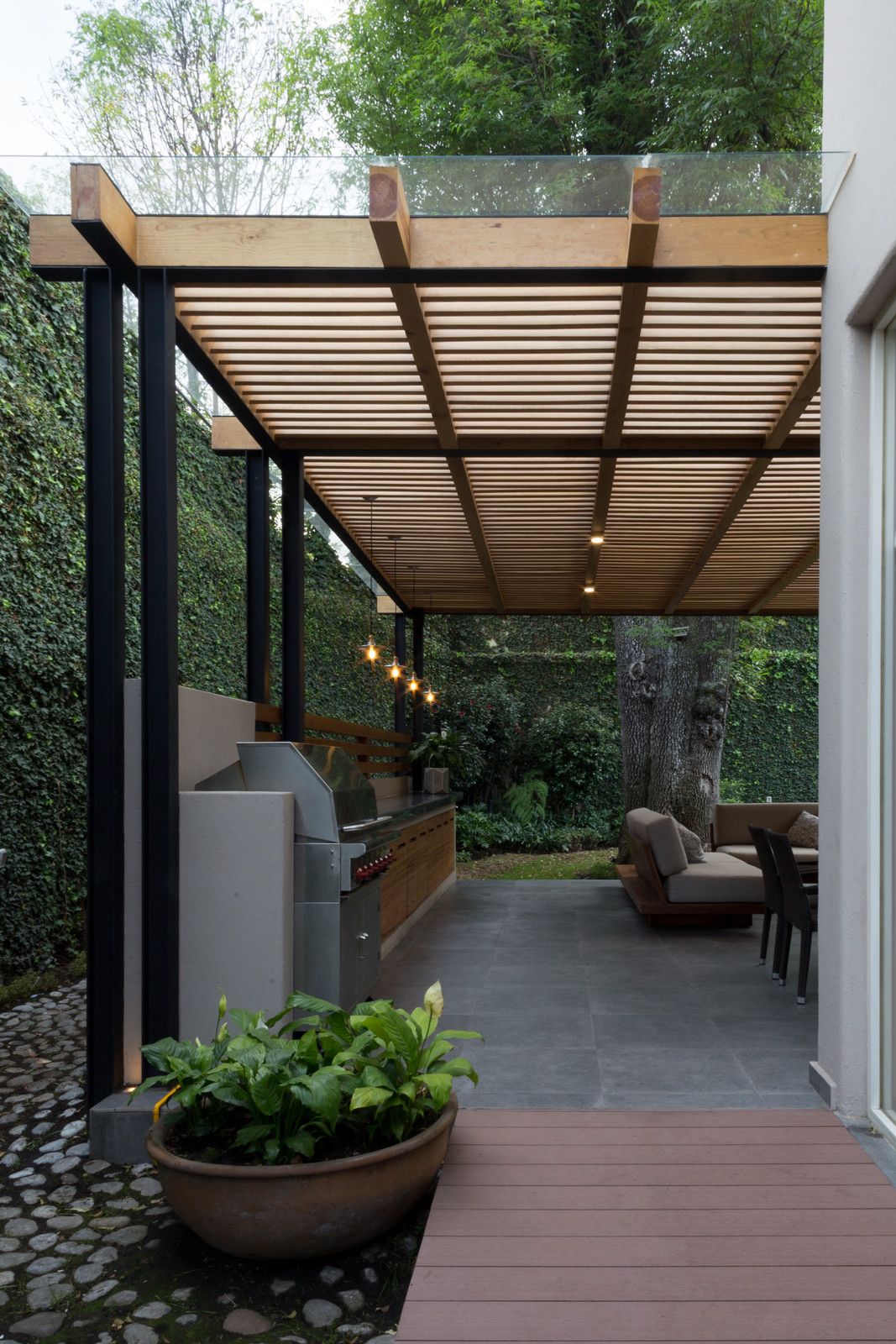 Creating a Sheltered Outdoor Space: The Benefits of a Patio Roof