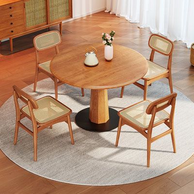 Elegant Circular Dining Room Tables with Matching Chairs