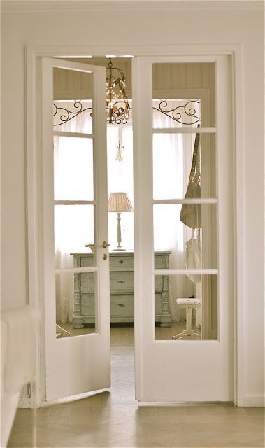 Elegant French Doors with Classic Glass Panels for Interior Spaces