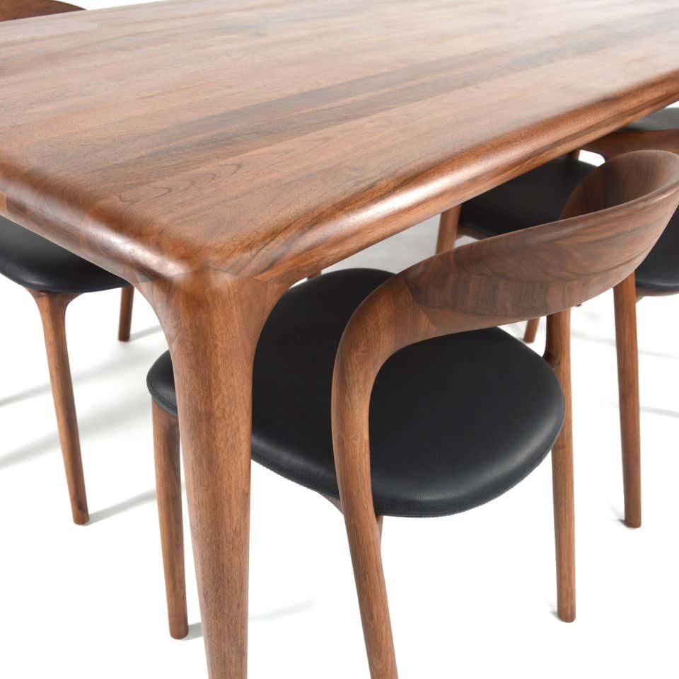 Enhance Your Dining Space with Exquisite Wooden Table and Chairs