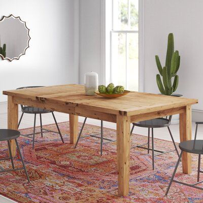 Expanding Your Dining Space: The Versatility of Dining Room Tables with Leafs