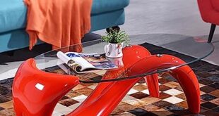 Elevate Our Space: A Review of the Red Oval Glass Coffee Table