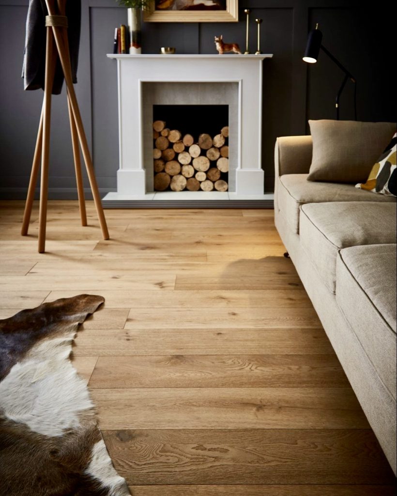 Wide plank warm wood flooring with knots