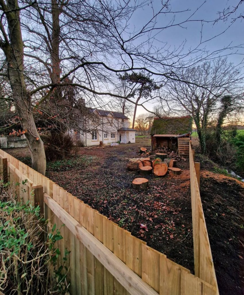 Rustic vertical plank fence