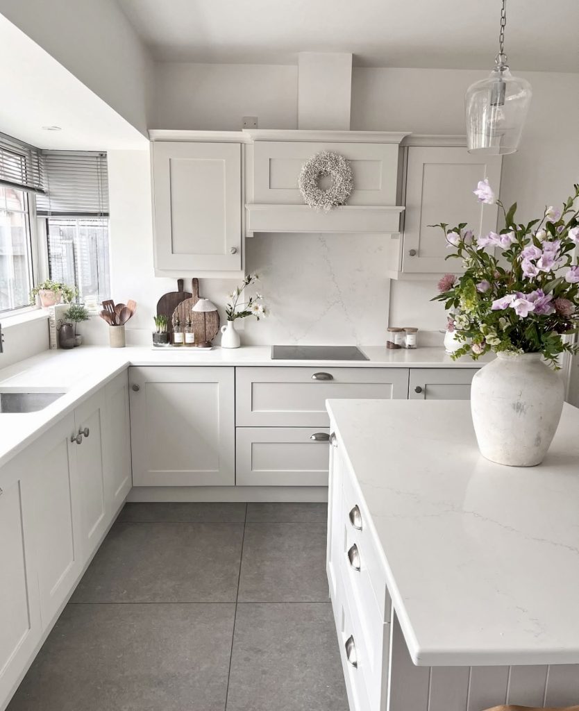 Minimalist White Kitchen with Marble Countertops