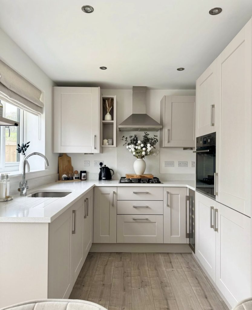 Compact U-Shaped Kitchen with White Countertops