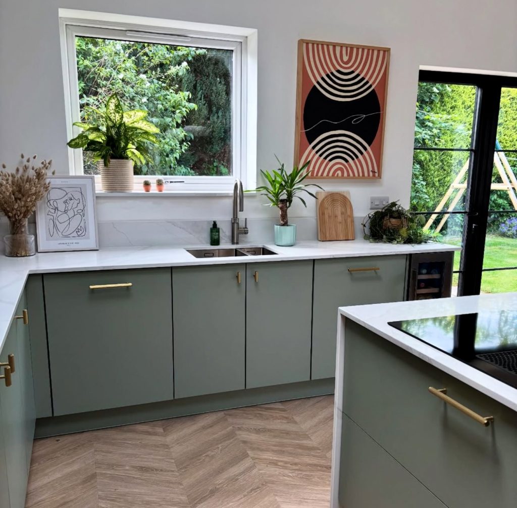 Earthy Green Kitchen Cabinets with White Countertops