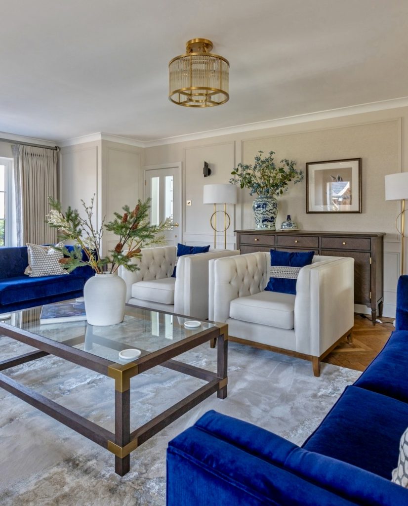 Navy velvet living room with gold accents