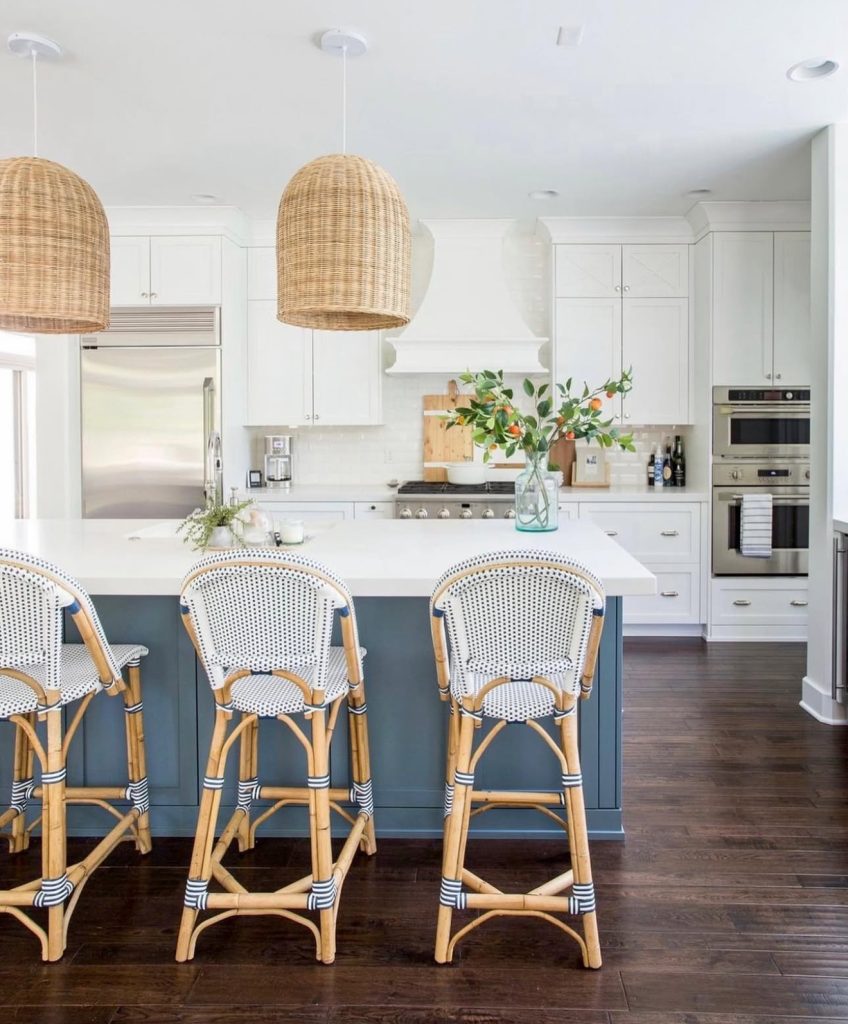 French coastal kitchen with antique cane bistro stools