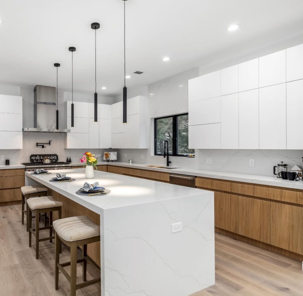 Scandinavian kitchen with white and wood cabinetry