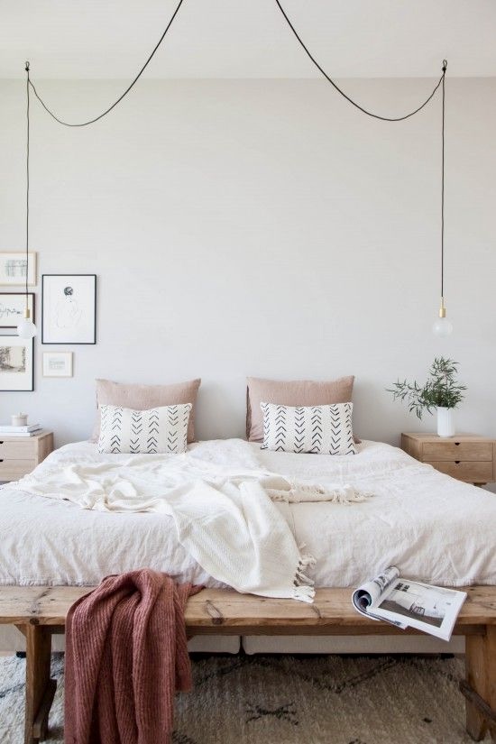 Scandinavian bedroom with hanging lights