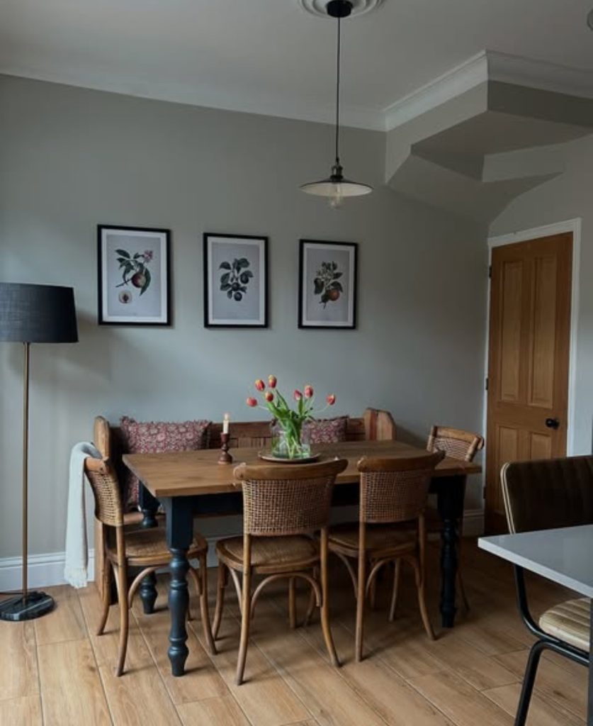 Vintage botanical prints in dining room