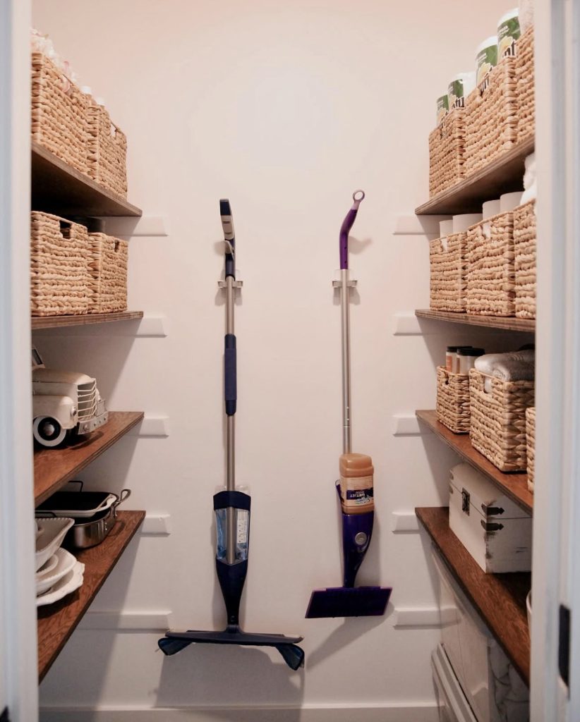 Linen closet with cleaning supplies