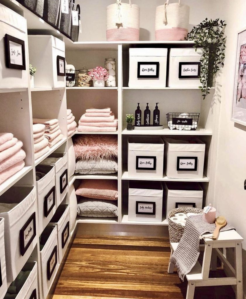 Soft glam linen closet with blush pink towels