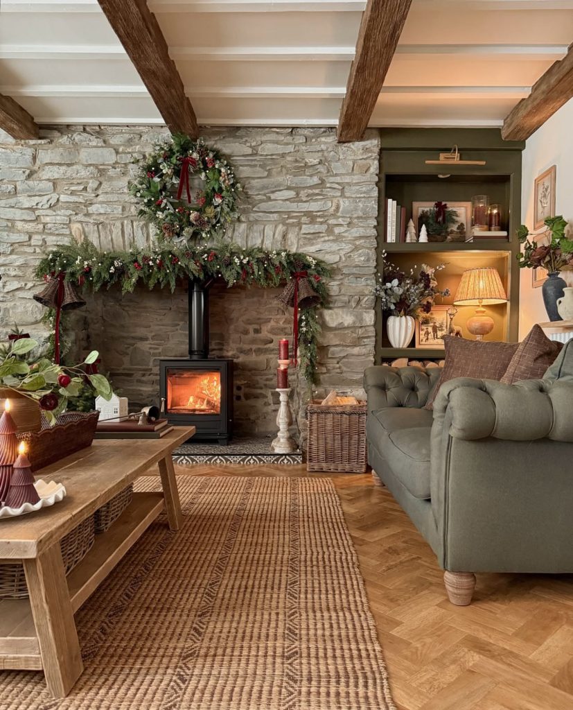 Rustic fireplace with greenery and pinecones