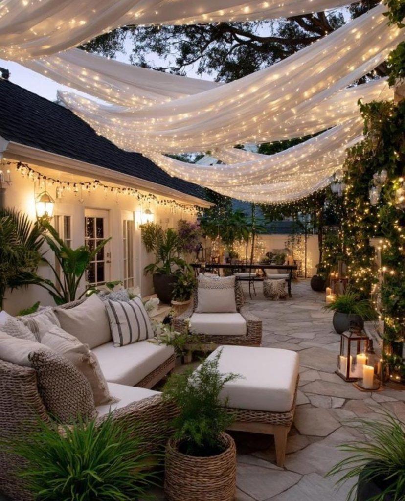 Outdoor patio with draped canopy lights