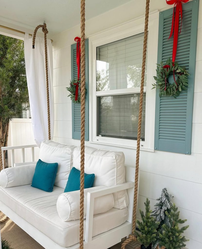 Porch swing decorated for Christmas